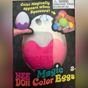 Schylling Nee Doh Magic Color Eggs Squeeze Ball - WHITE shell.
